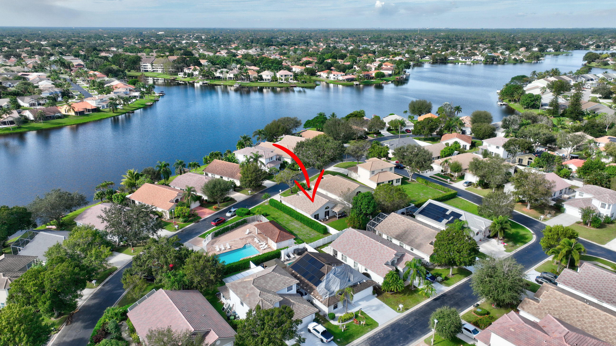 12204 Sunset Point Circle Wellington, FL 33414 - Photo 38 of 40 an aerial view of lake residential house with outdoor space