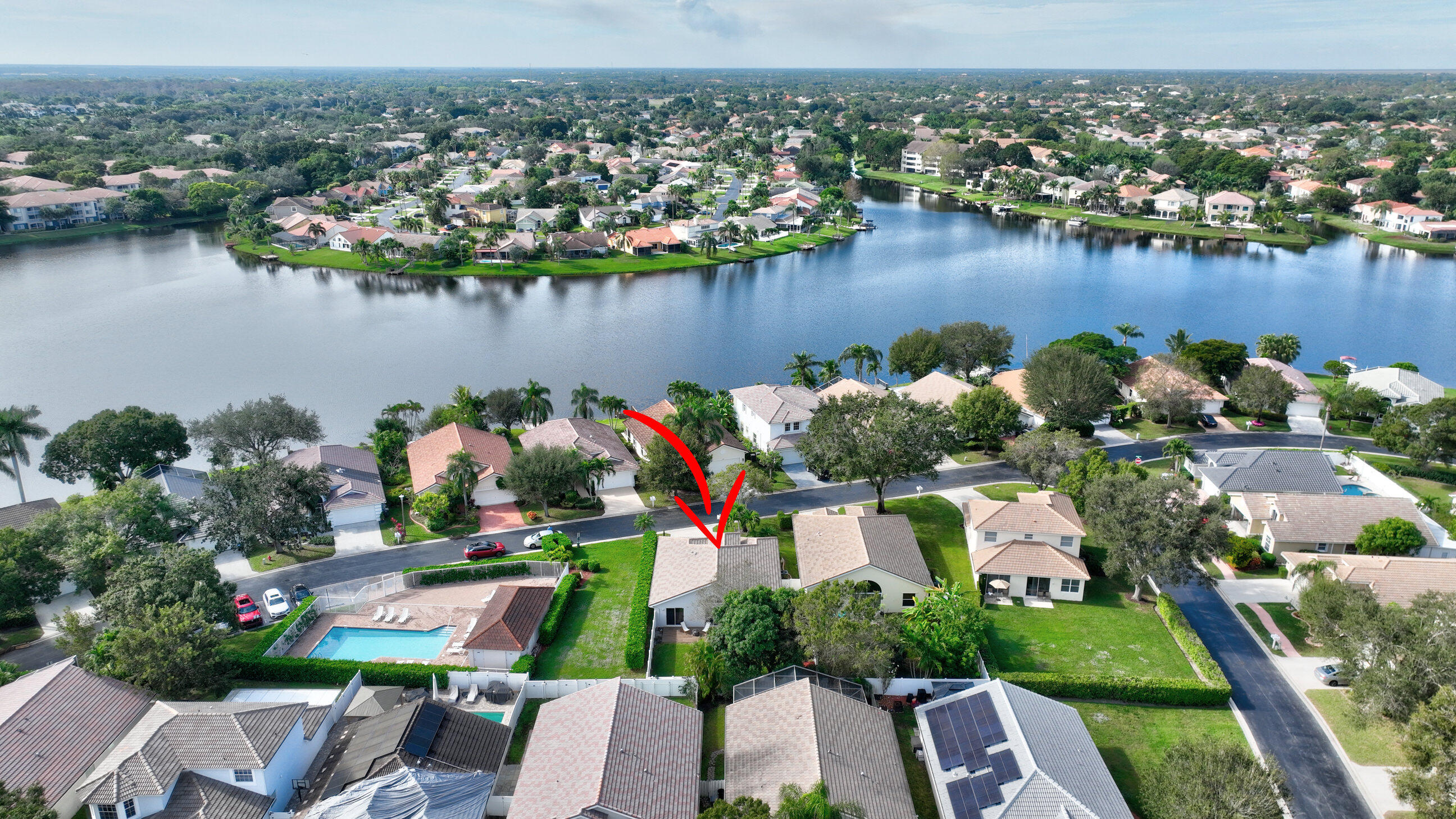 12204 Sunset Point Circle Wellington, FL 33414 - Photo 39 of 40 an aerial view of lake residential house with outdoor space