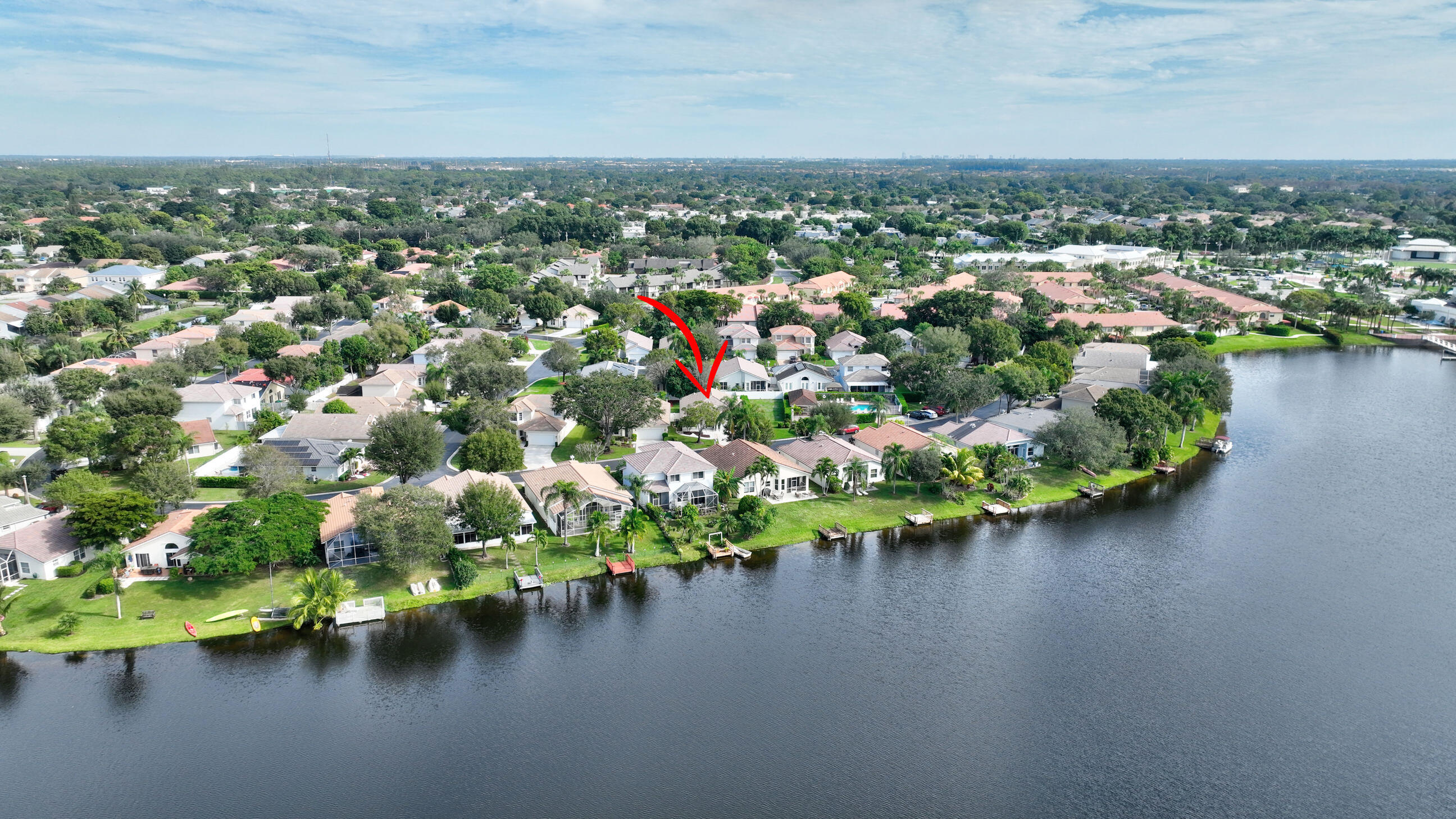 12204 Sunset Point Circle Wellington, FL 33414 - Photo 40 of 40 an aerial view of a houses with a lake view