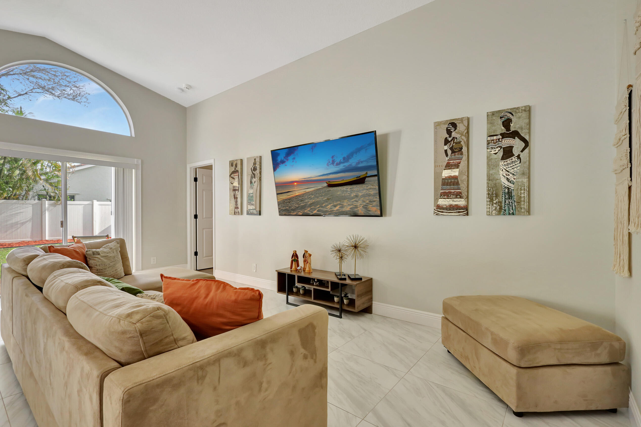 12204 Sunset Point Circle Wellington, FL 33414 - Photo 7 of 40 a living room with furniture and a couch