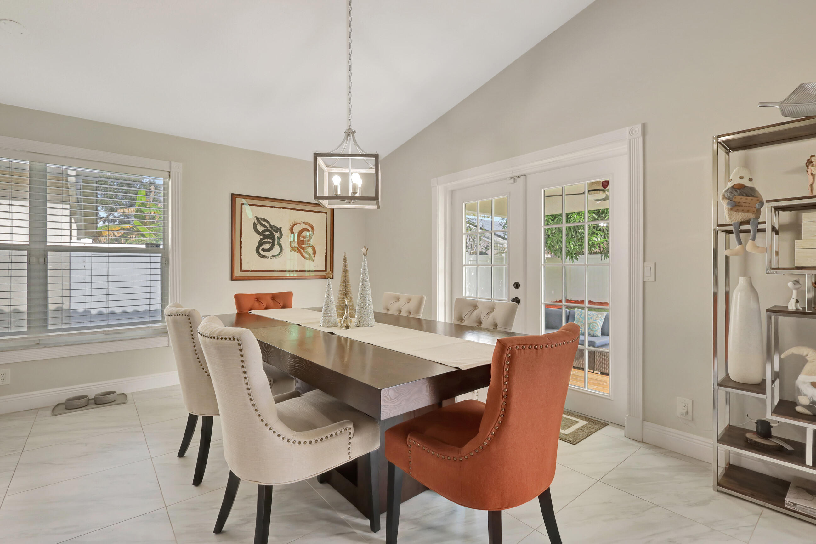 12204 Sunset Point Circle Wellington, FL 33414 - Photo 10 of 40 a view of a dining room with furniture window and outside view