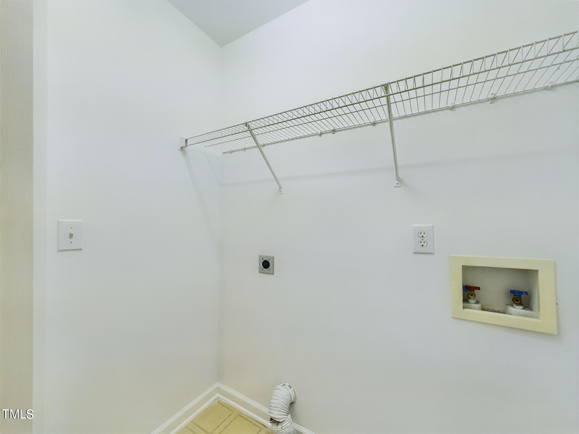 11124 Slider Drive Raleigh, NC 27614 - Photo 25 of 62 a bathroom with a shower and white walls
