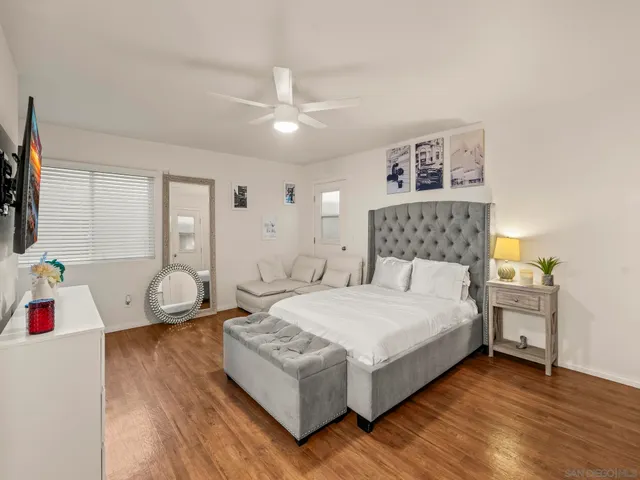 a view of entryway with wooden floor and stairs