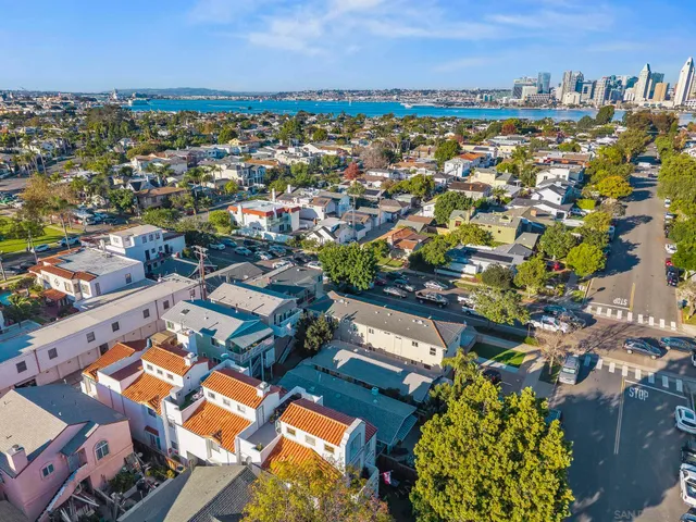 an aerial view of a house with a ocean view