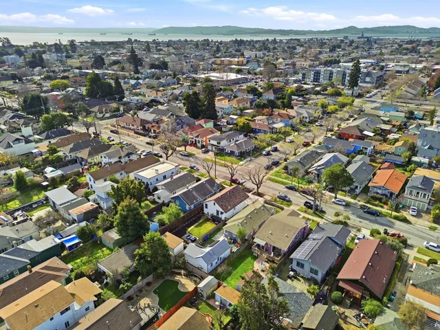 an aerial view of a city with lots of residential buildings