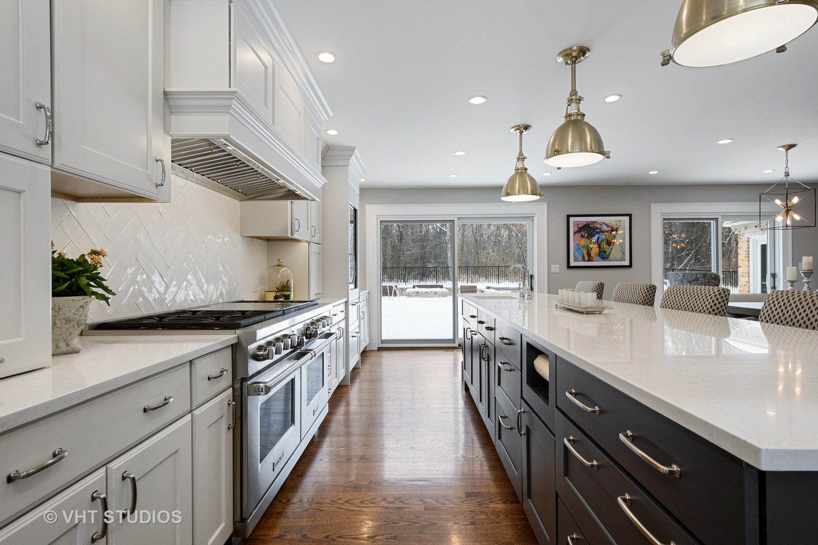 6814 Red Barn Road Crystal Lake, IL 60012 - Photo 14 of 50 a large kitchen with stainless steel appliances granite countertop a lot of counter space and a sink
