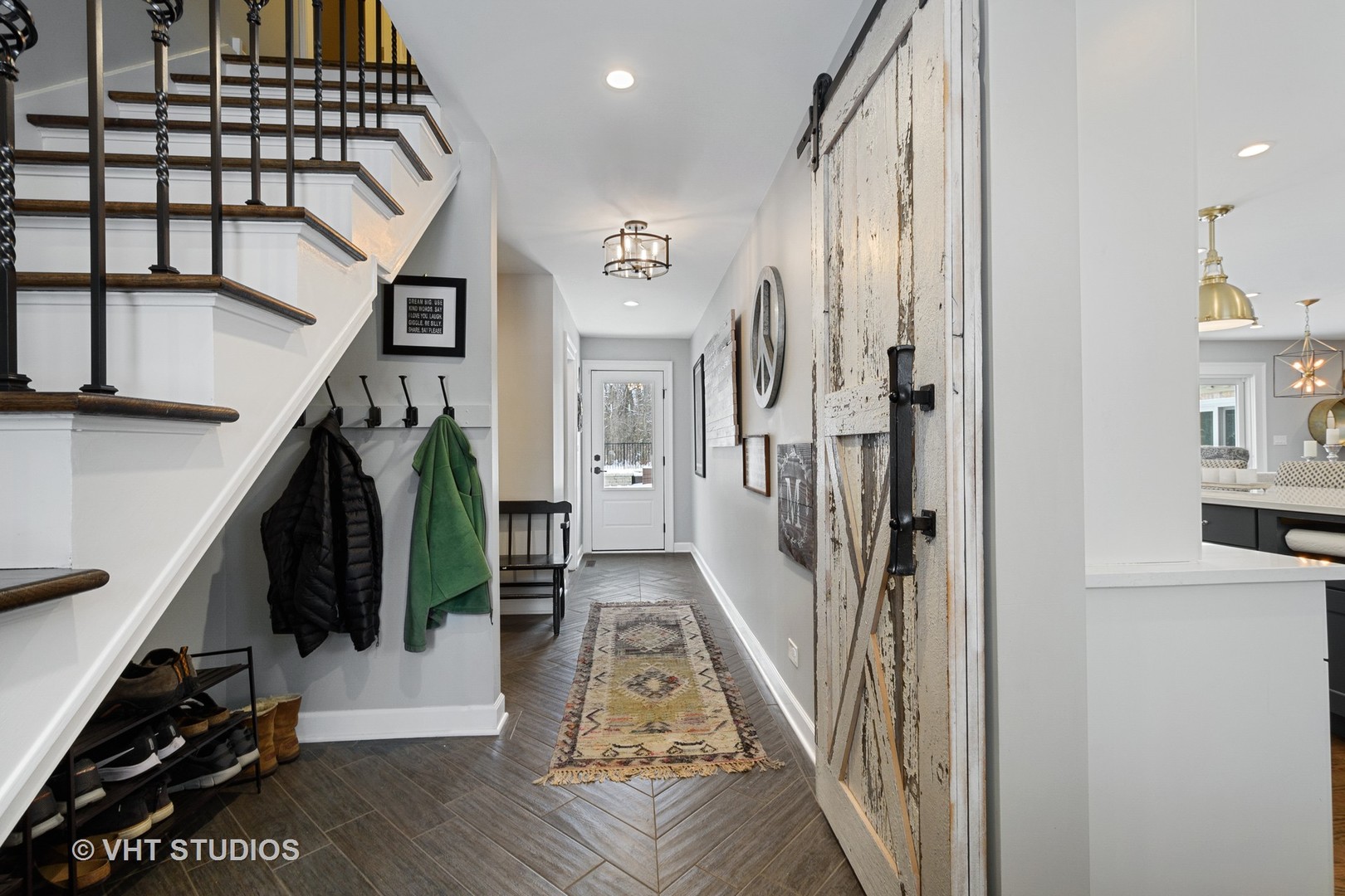 6814 Red Barn Road Crystal Lake, IL 60012 - Photo 36 of 50 a view of a hallway with wooden floor and stairs