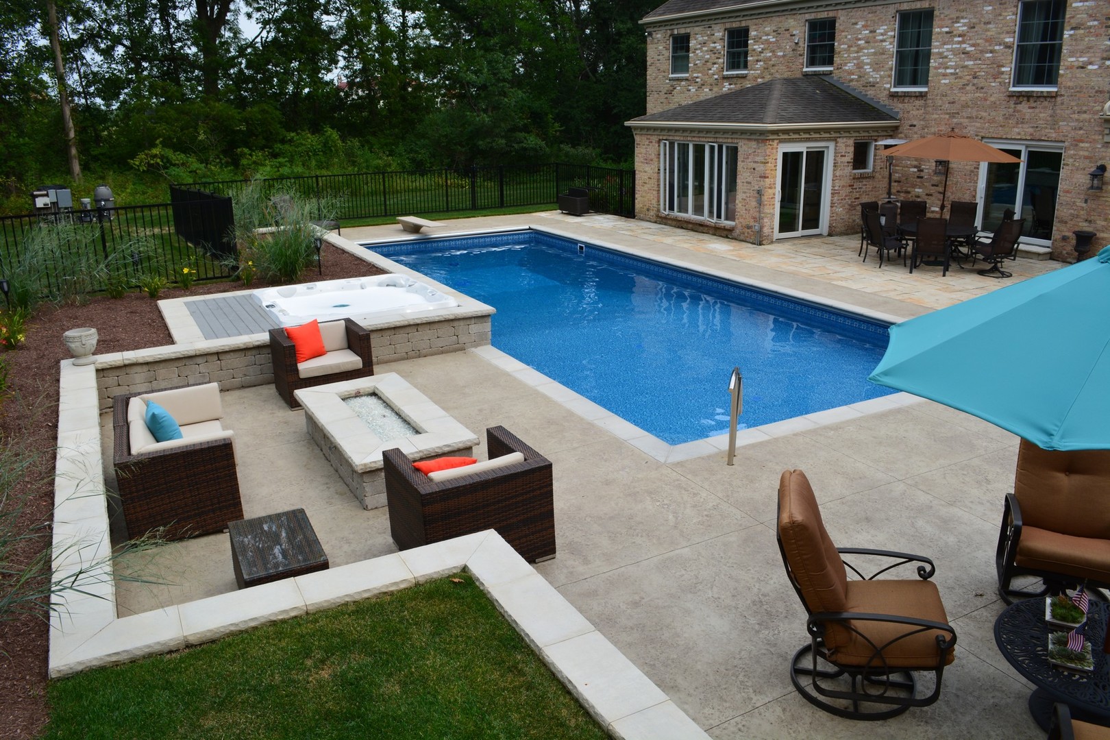 6814 Red Barn Road Crystal Lake, IL 60012 - Photo 41 of 50 a view of a patio with table and chairs with wooden floor and fence