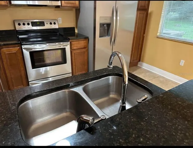 a view of a room with white walls