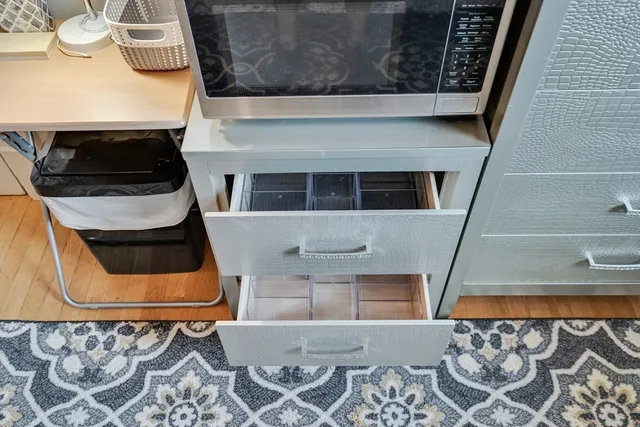 a kitchen with a stove and a microwave