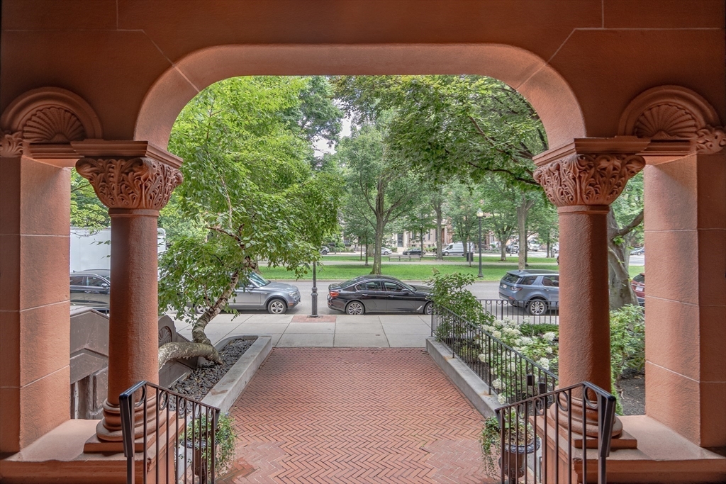 290 Commonwealth Avenue, Unit 8 Boston, MA 02115 - Photo 31 of 32 a couple of potted plants in front of a building