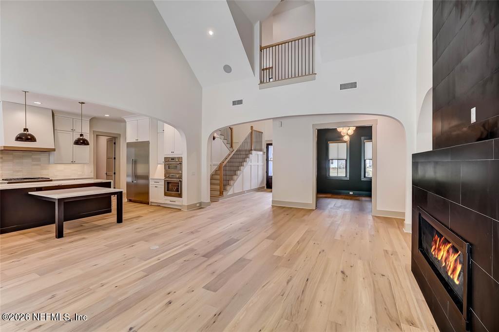 16385 Waterville Road, Unit 1 Jacksonville, FL 32226 - Photo 10 of 24 a view of a livingroom with wooden floor and furniture