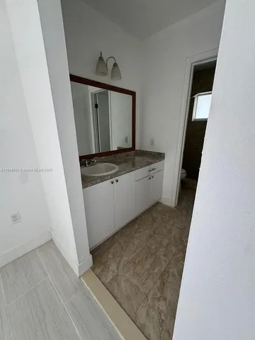 a view of a livingroom with a window