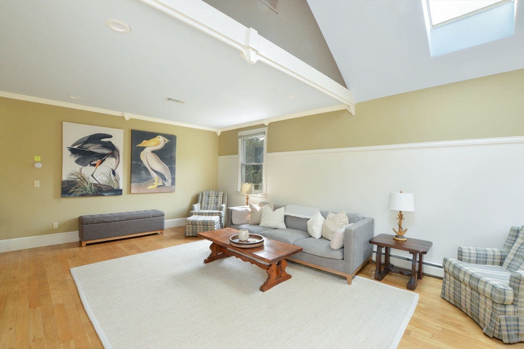 48 Tara Terrace Bourne, MA 02532 - Photo 12 of 33 a living room with furniture and a rug