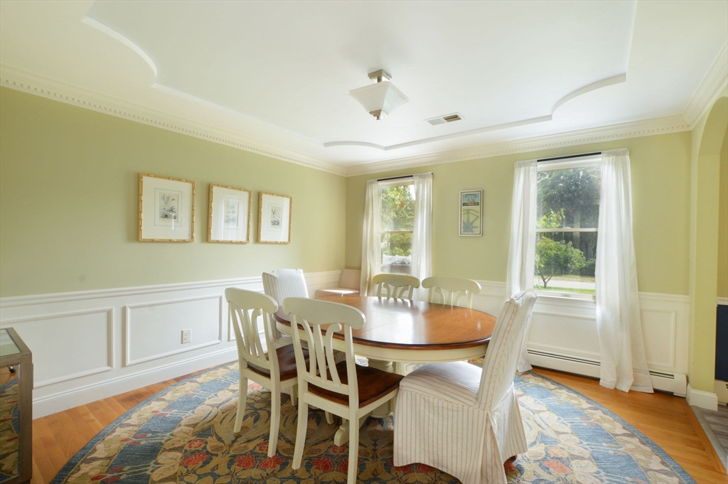 48 Tara Terrace Bourne, MA 02532 - Photo 14 of 33 a view of a dining room with furniture and wooden floor