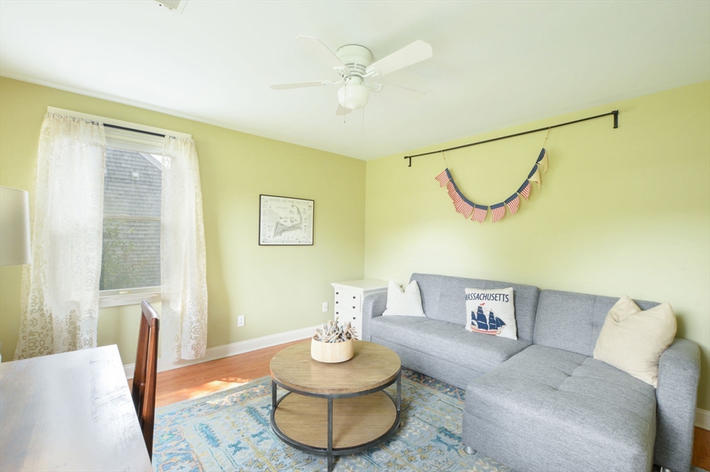 48 Tara Terrace Bourne, MA 02532 - Photo 20 of 33 a living room with furniture and a table