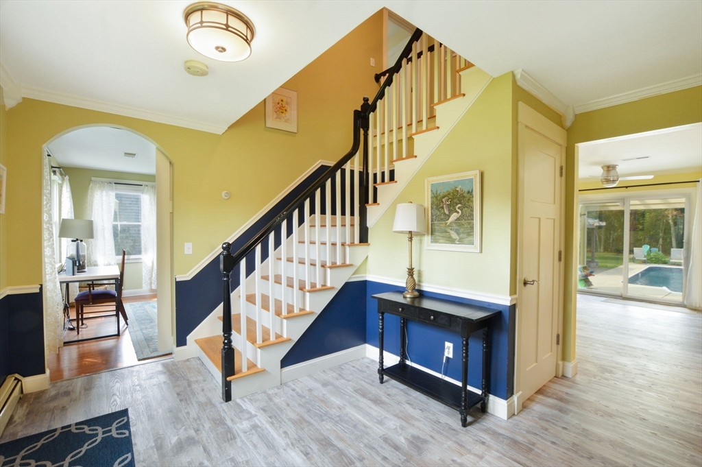 48 Tara Terrace Bourne, MA 02532 - Photo 9 of 33 a view of an entryway with wooden floor and staircase