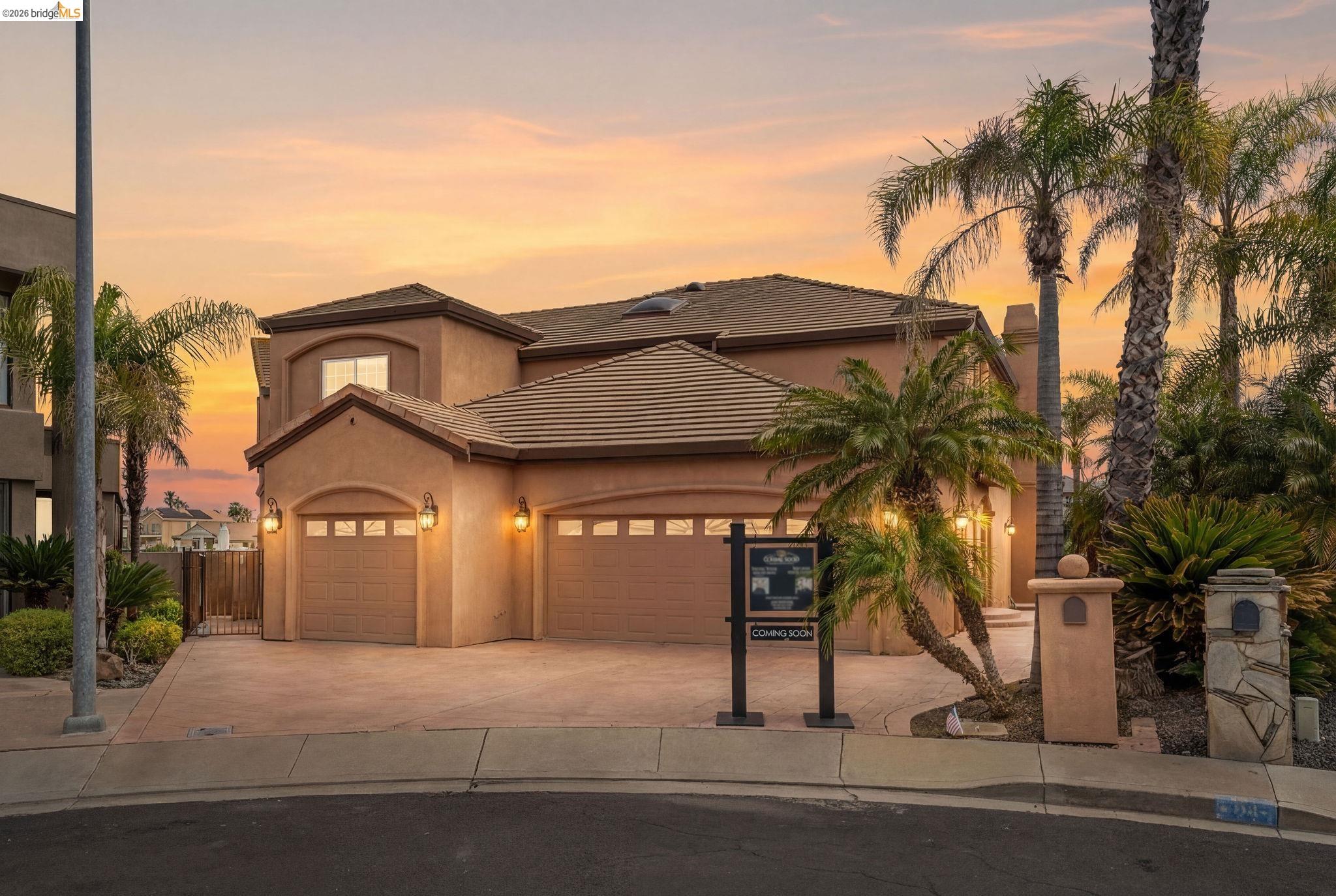 96 Shell Place Discovery Bay, CA 94505 - Photo 1 of 46 a front view of a house with a yard and garage