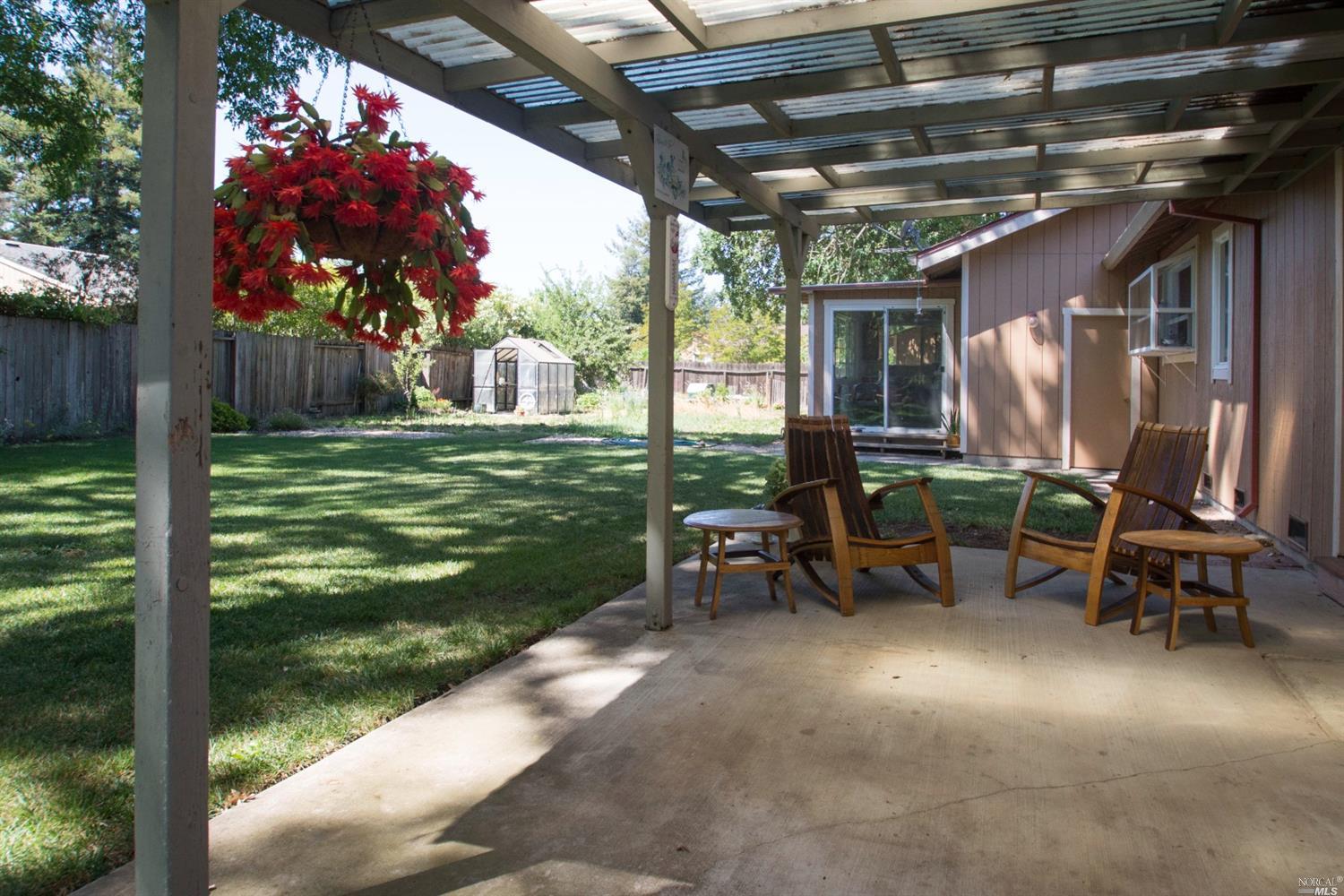 4704 Culebra Way Santa Rosa, CA 95409 - Photo 1 of 1 a view of a two chairs in the patio next to a yard