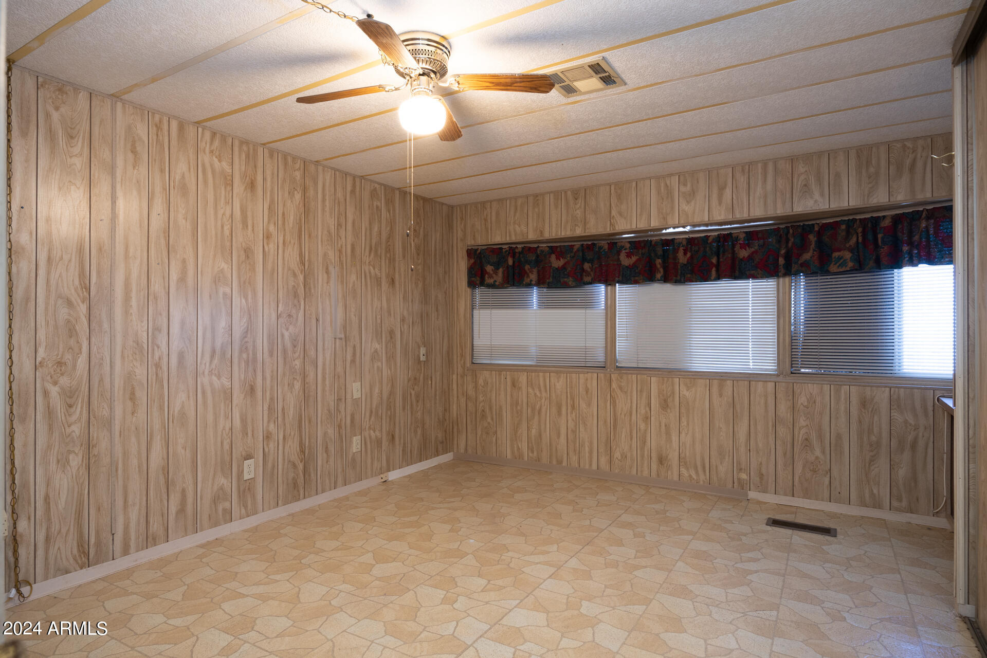 2100 North Trekell Road, Unit 148 Casa Grande, AZ 85122 - Photo 12 of 36 a view of a garage