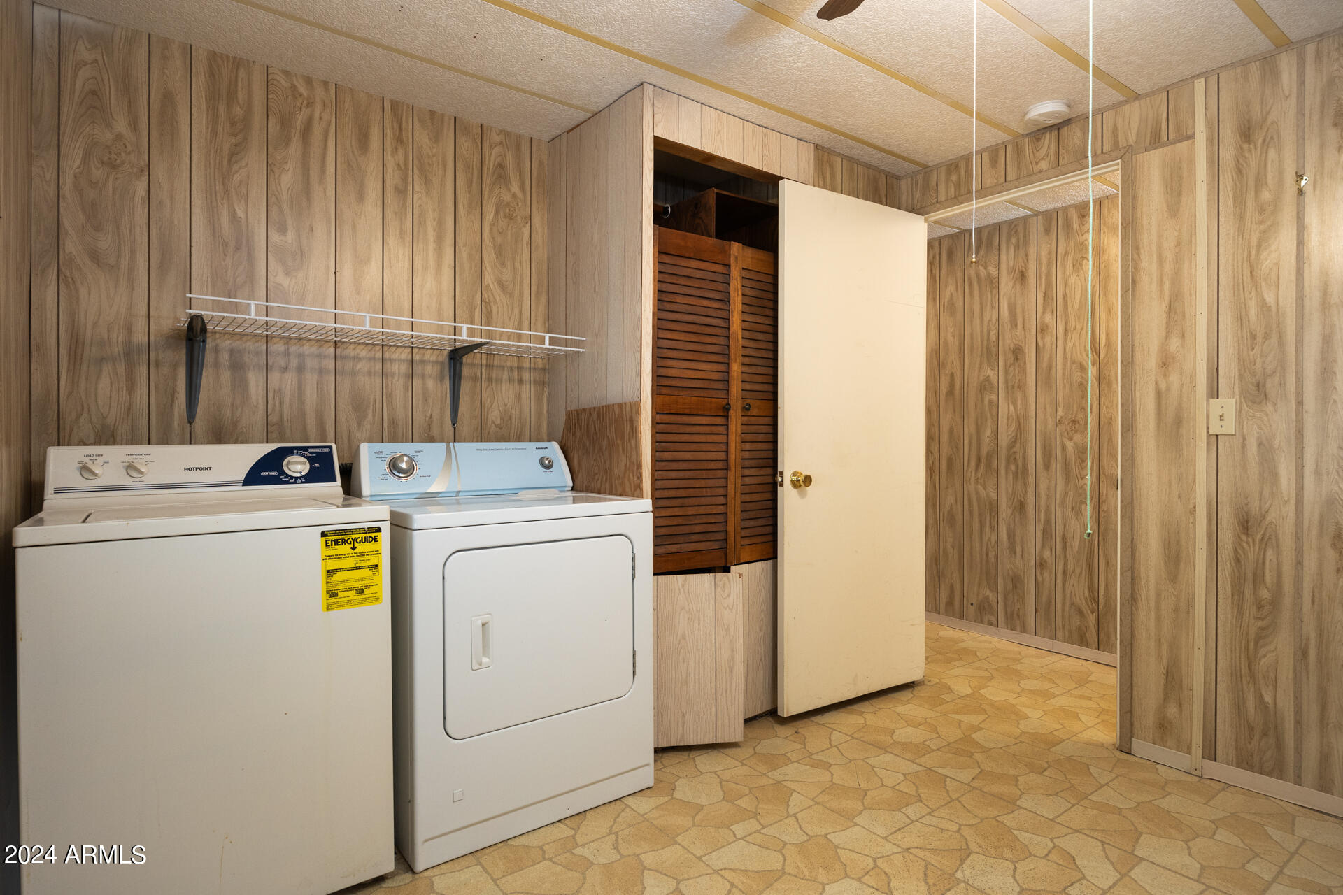 2100 North Trekell Road, Unit 148 Casa Grande, AZ 85122 - Photo 16 of 36 a utility room with dryer and washer