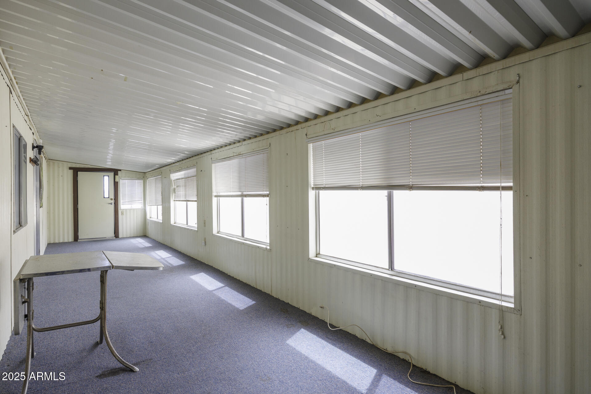 2100 North Trekell Road, Unit 148 Casa Grande, AZ 85122 - Photo 17 of 36 a view of an empty room with a window