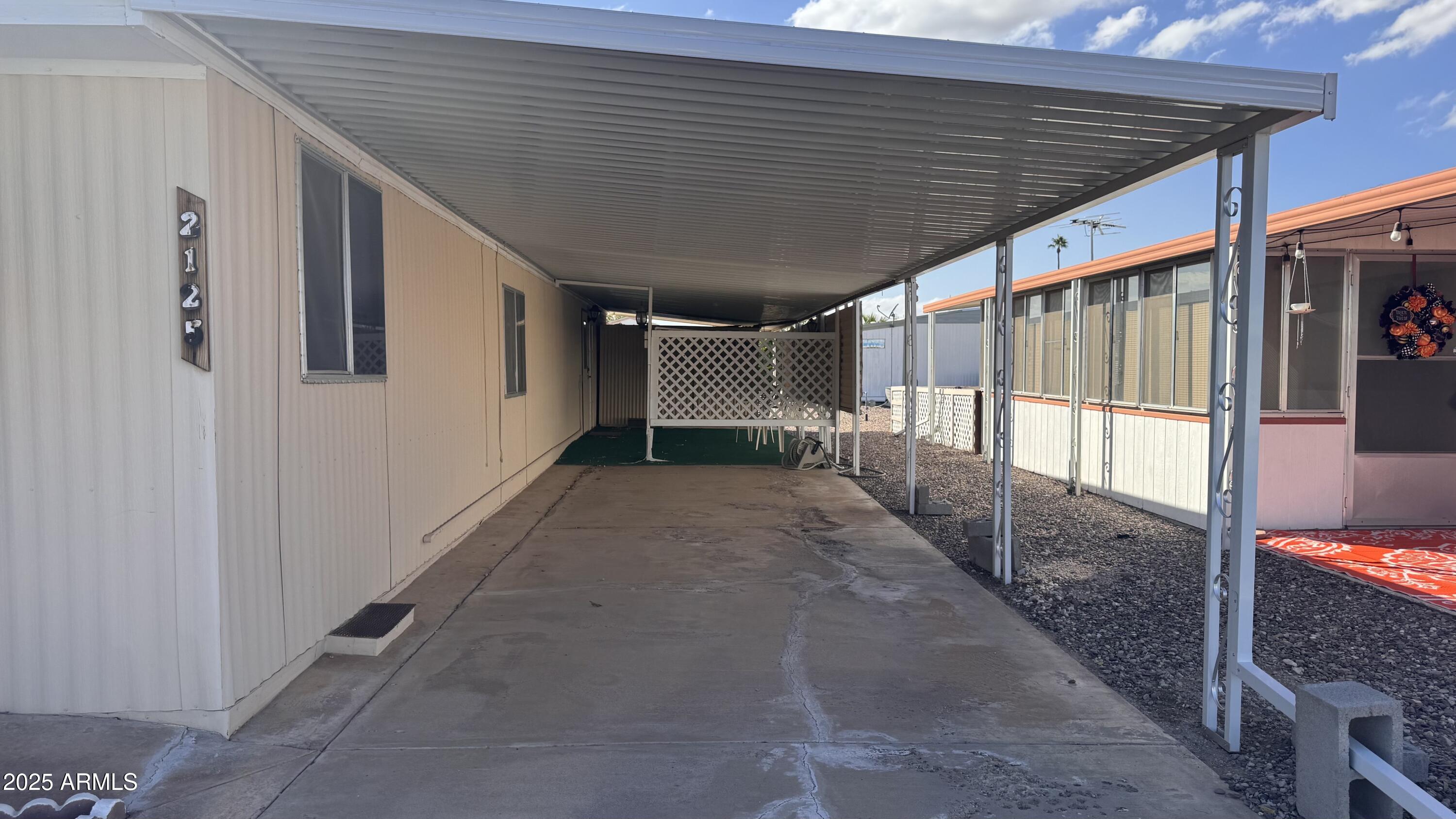 2100 North Trekell Road, Unit 148 Casa Grande, AZ 85122 - Photo 21 of 36 a view of a porch