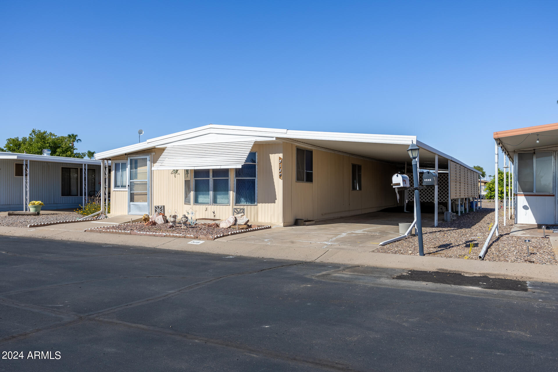 2100 North Trekell Road, Unit 148 Casa Grande, AZ 85122 - Photo 4 of 36 a view of a house with basketball court