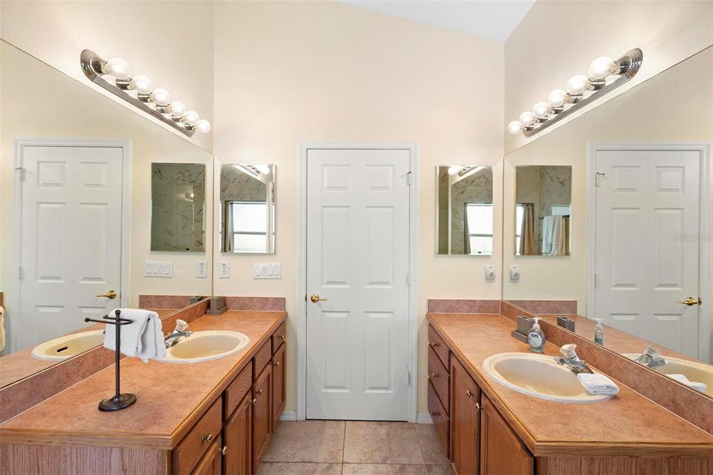 2535 Oneida Loop Kissimmee, FL 34747 - Photo 36 of 59 Dual Vanity Primary Bath