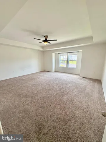 a bathroom with a sink double vanity granite and a mirror