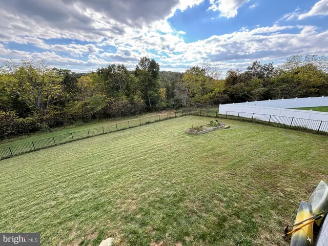 a terrace with a garden and stairs