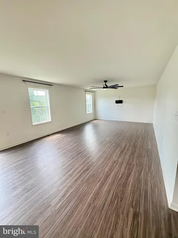 a bathroom with a sink toilet and a mirror