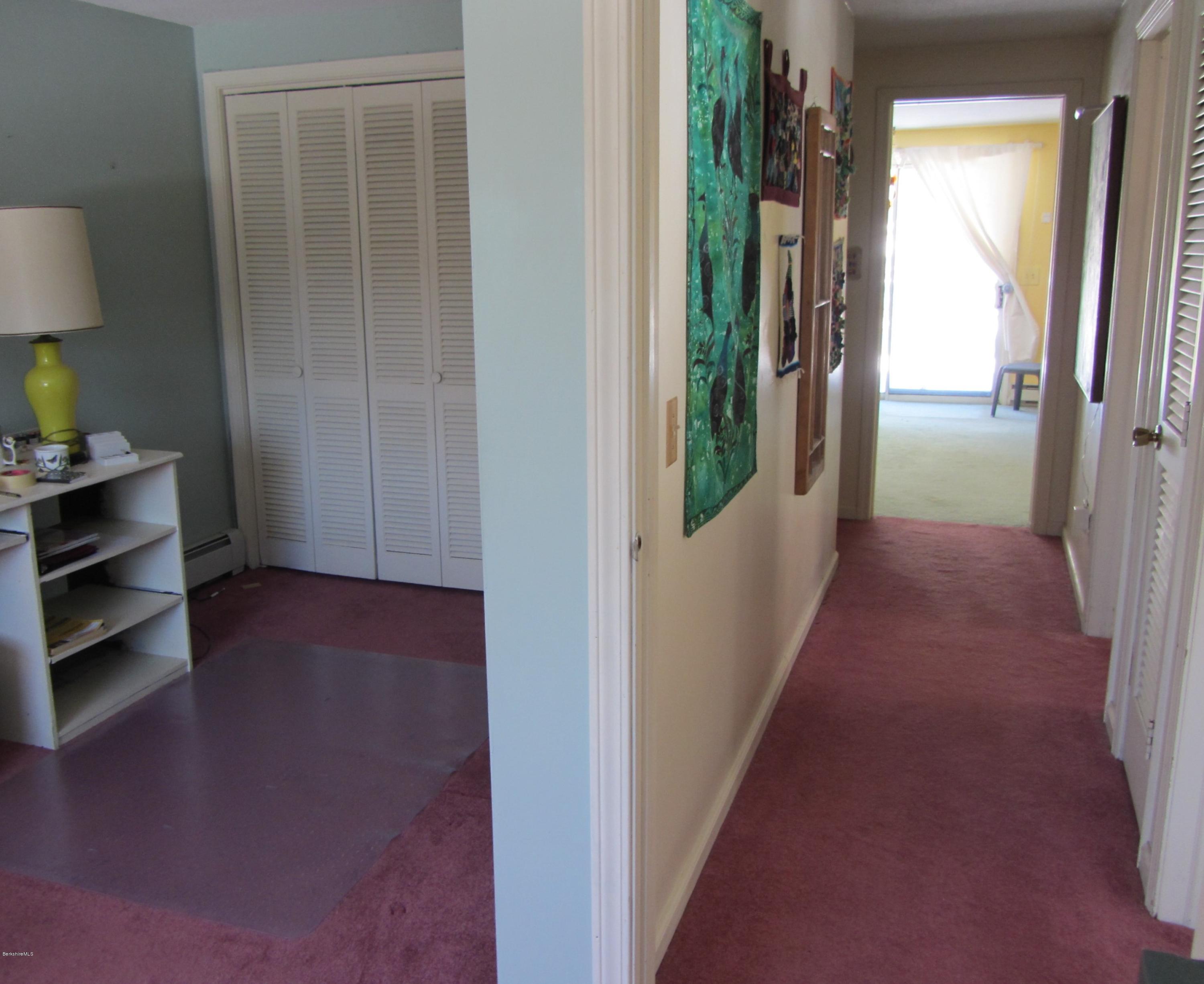 2131 Dublin Road Richmond, MA 01254 - Photo 23 of 51 a view of a hallway with wooden shelves