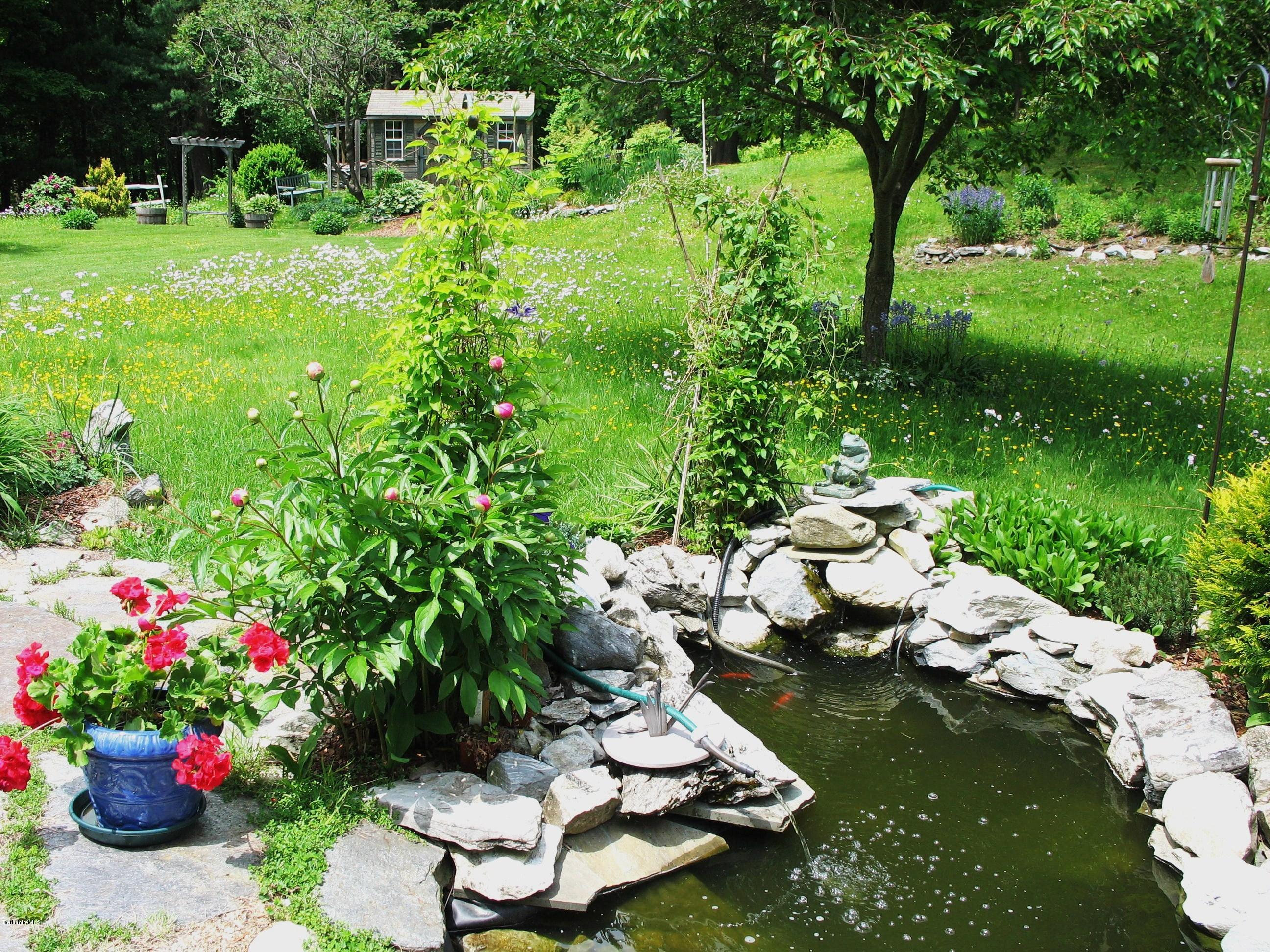 2131 Dublin Road Richmond, MA 01254 - Photo 40 of 51 a garden with lots of trees and flowers