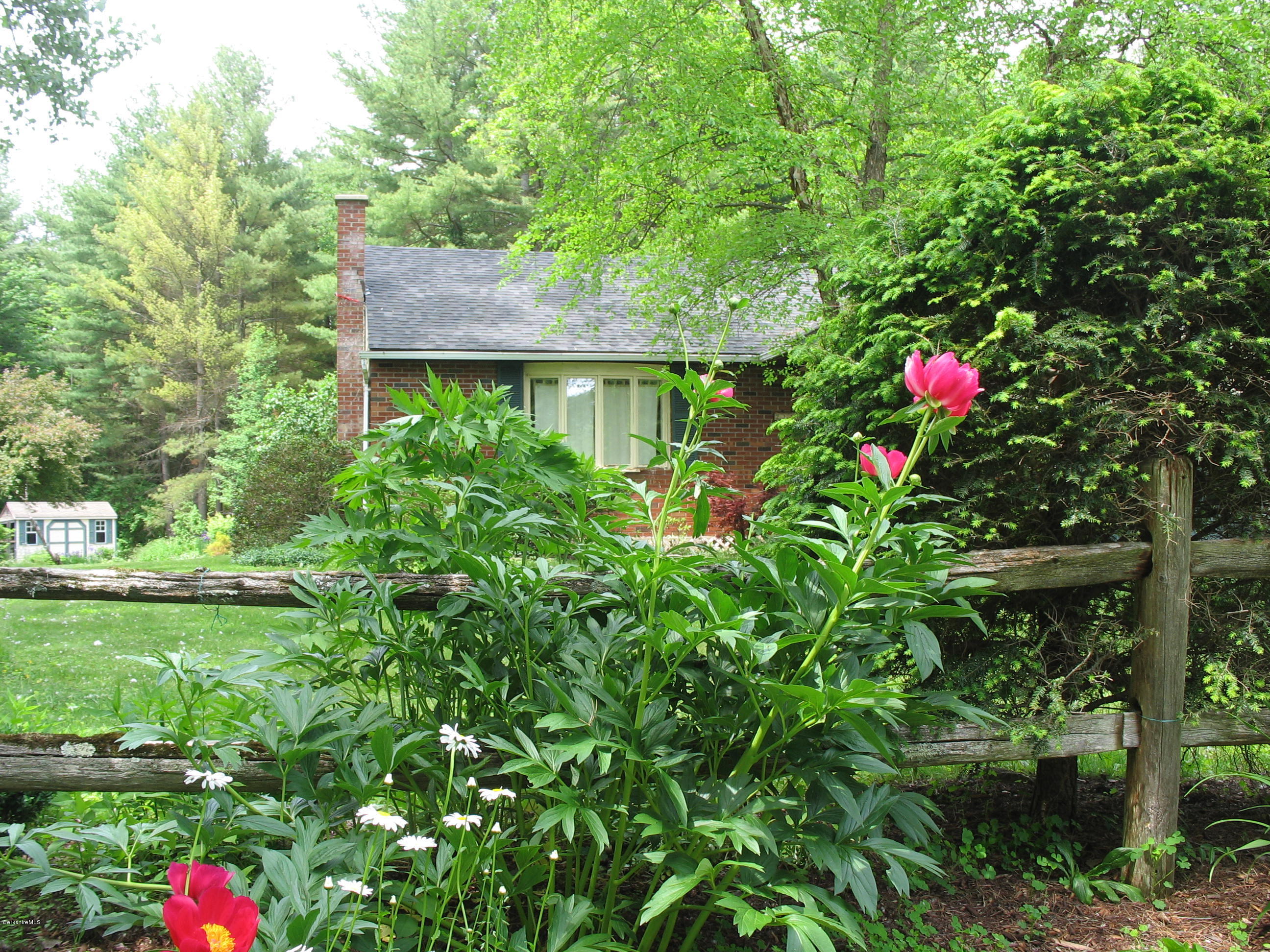2131 Dublin Road Richmond, MA 01254 - Photo 49 of 51 a front view of a house with yard
