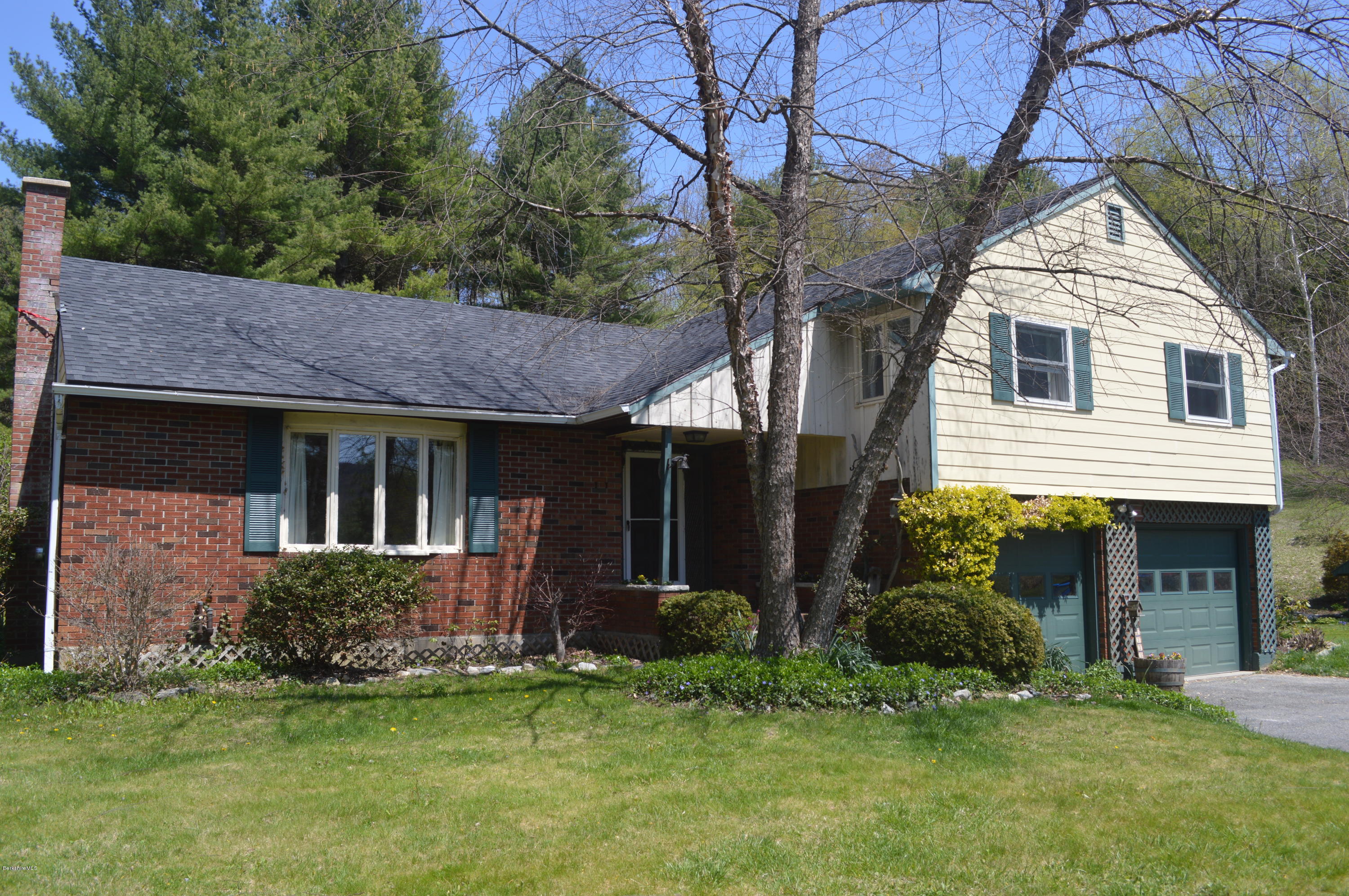 2131 Dublin Road Richmond, MA 01254 - Photo 51 of 51 a front view of a house with a yard and garage