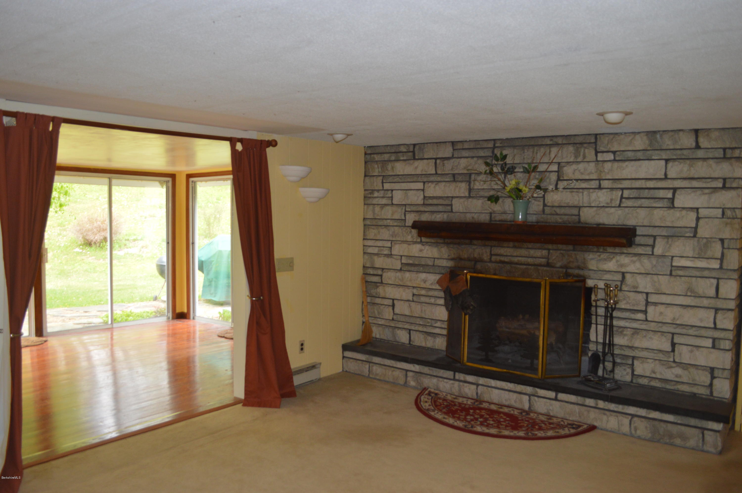 2131 Dublin Road Richmond, MA 01254 - Photo 10 of 51 a living room with fireplace