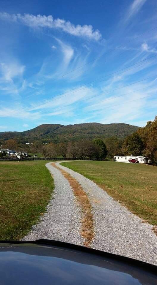 4235-4237 Jordantown Road Vinton, VA 24179 - Photo 3 of 6 a view of a lake with a houses
