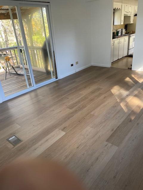 4235-4237 Jordantown Road Vinton, VA 24179 - Photo 5 of 6 a view of an empty room and a window