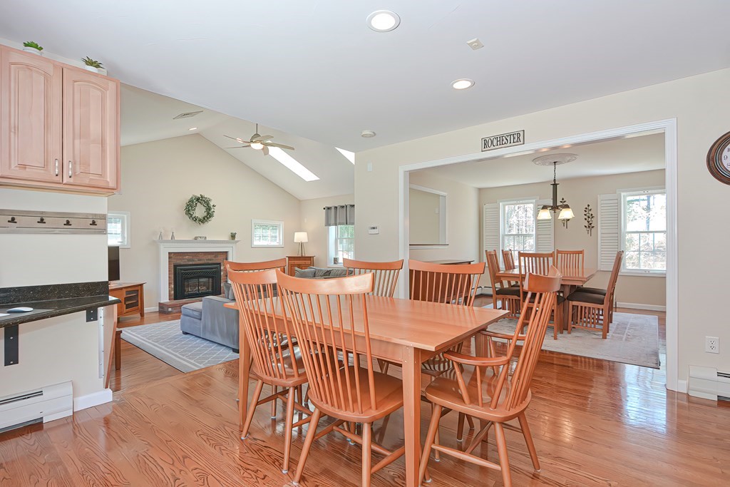 101 Paradise Lane Rochester, MA 02770 - Photo 5 of 42 a view of a dining room with furniture window and wooden floor