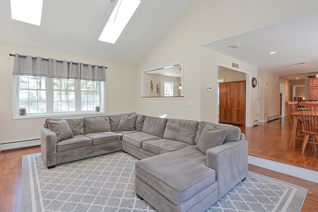 101 Paradise Lane Rochester, MA 02770 - Photo 8 of 42 a living room with furniture and a window