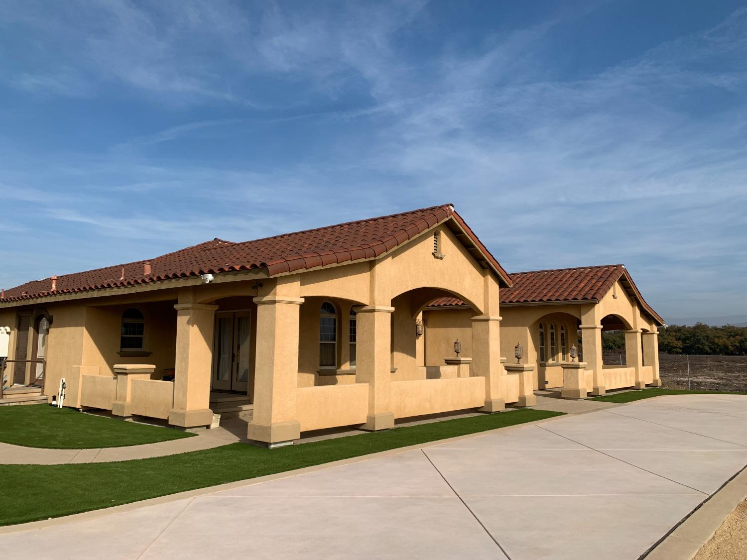 1662 South Alta Avenue Reedley, CA 93654 - Photo 13 of 30 a view of white house with yard