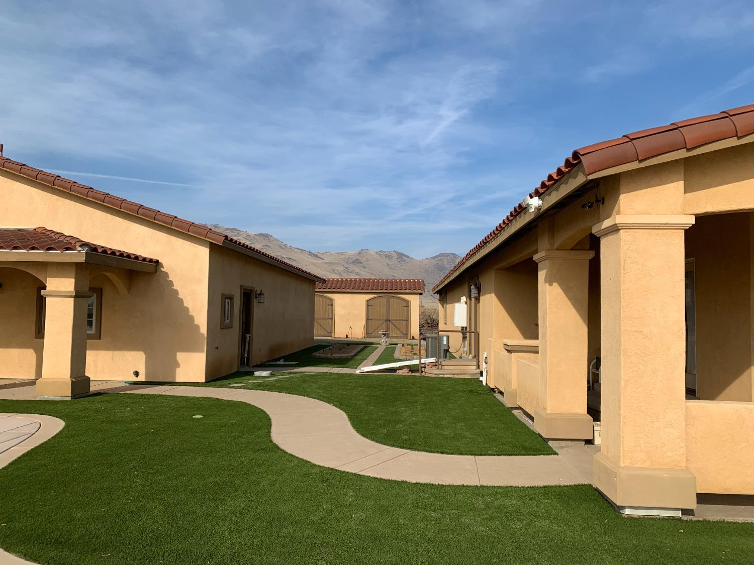 1662 South Alta Avenue Reedley, CA 93654 - Photo 14 of 30 a view of a yard in front of a house