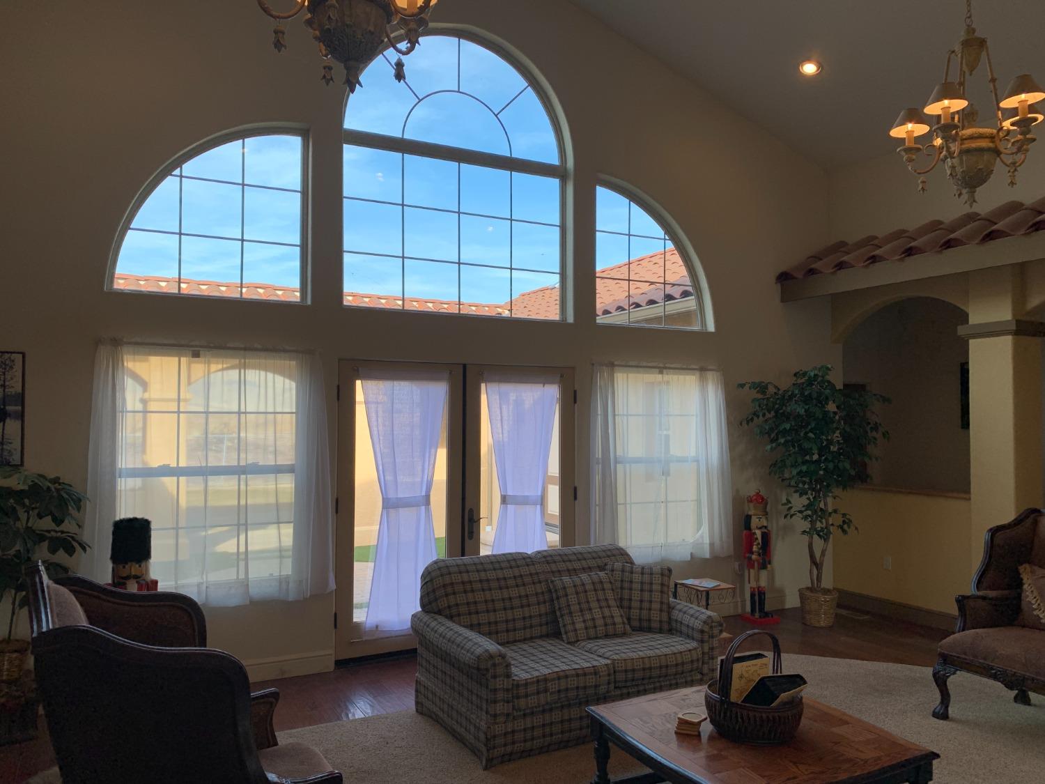 1662 South Alta Avenue Reedley, CA 93654 - Photo 17 of 30 a living room with furniture and a large window