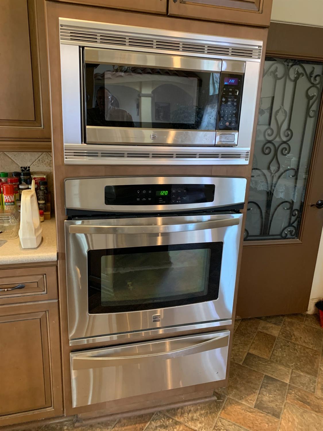 1662 South Alta Avenue Reedley, CA 93654 - Photo 22 of 30 a stove top oven sitting inside of a kitchen