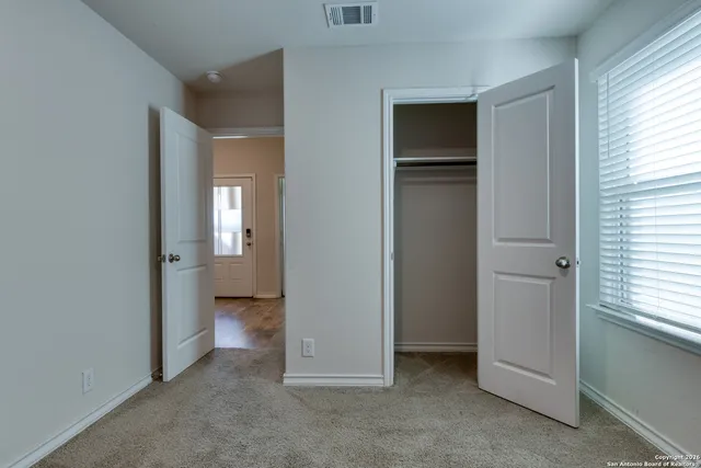 a view of backyard with green space