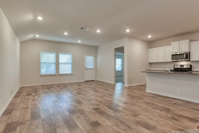 a view of kitchen and front door