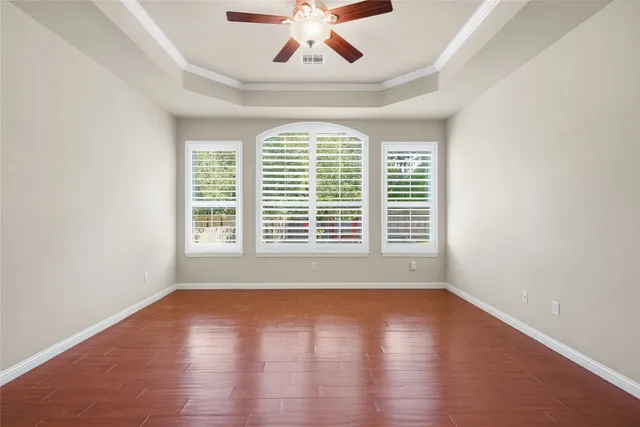 a view of livingroom with window and hardwood floor