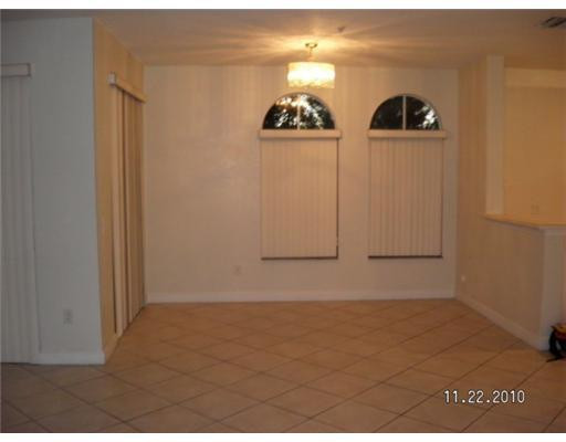 4445 Southwest 160th Avenue, Unit 101 Miramar, FL 33027 - Photo 3 of 8 a view of wooden floor