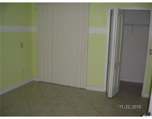 4445 Southwest 160th Avenue, Unit 101 Miramar, FL 33027 - Photo 7 of 8 a view of an empty room